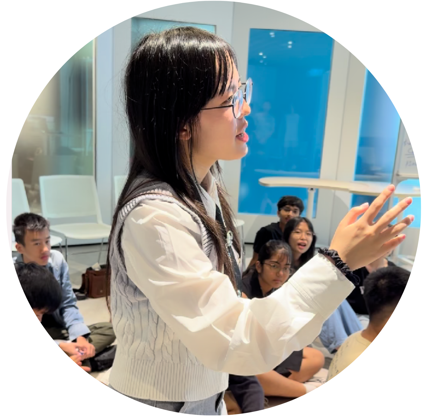 a photo of a girl named Nicole, giving speech